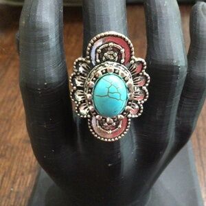 Stretchy band ring with silver and turquoise colored stone
